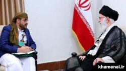 Iranian Supreme Leader Ayatollah Ali Khamenei (right) meets with Huthi movement spokesman, Mohammad Abdul Salam, in Tehran on August 13.