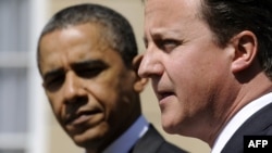 British Prime Minister David Cameron (right) and U.S. President Barack Obama (file photo)