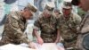 Armenia - Defense Minister Seyran Ohanian (L) visits an Armenian army post on the border with Azerbaijan, 9Aug2013.