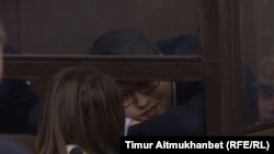 Бывший министр национальной экономики Казахстана Куандык Бишимбаев в суде по его делу. Март 2018 года