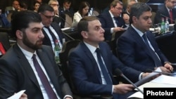 Armenia - Davit Sanasarian (L), head of the State Oversight Service, and Artur Vanetsian (R), director of the Natonal Security Service, at a cabinet meeting in Yerevan, February 21, 2019.