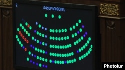 Armenia - The results of Armenian parliament vote on the ratification of an accession treaty with the Eurasian Economic Union shown on a screen, Yerevan, 4Dec2014.