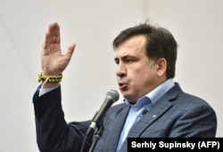 Former Odesa Governor Mikheil Saakashvili speaks during the rally outside the Ukrainian parliament in Kyiv on October 17.