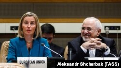 EU foreign policy chief Federica Mogherini (left) and Iranian Foreign Minister Mohammad Javad Zarif attend a ministerial meeting of the P5+1 countries and Iran held on the sidelines of the 73rd session of the UN General Assembly.