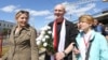 Ales Byalyatski is welcomed at Minsk's railway station by his family on June 21.