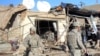 Iraqi City In Lockdown As Police Hunt Bombers