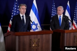 Госсекретарь США Энтони Блинкен и премьер-министр Израиля Биньямин Нетаньяху на совместной пресс-конференции в Тель-Авиве. 12 октября 2023 года