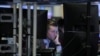 A trader works on the floor at the New York Stock Exchange (NYSE) in New York, U.S., November 20, 2018. REUTERS/Brendan McDermid TPX IMAGES OF THE DAY