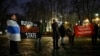 Protesters gather on February 16 in front of the Russian Embassy in Stockholm after the news that the Kremlin's most prominent critic, Alekesei Navalny, had died in an Arctic prison.