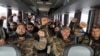 ARMENIA - Armenian volunteers and reservists ride in a bus towards the Karabakh frontline to fight with Azeri troops, October 6, 2020