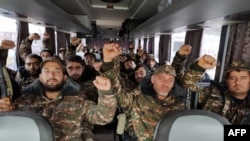 ARMENIA - Armenian volunteers and reservists ride in a bus towards the Karabakh frontline to fight with Azeri troops, October 6, 2020