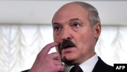 President Lukashenka speaks to journalists after voting today