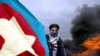 Turkish Kurd holding a Kurdistan Workers Party (PKK) flag at a demonstration in Istanbul on March 19