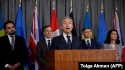 Canadian Foreign Minister Francois-Philippe Champagne (C) addresses a press conference after a meeting of the International Coordination and Response Group to discuss the shooting down of an Ukrainian plane in Iran. Jan. 16, 2020