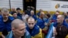 Former Ukrainian prisoners of war (POW) return after a prisoner swap, amid Russia's attack on Ukraine, in an undisclosed location in Ukraine