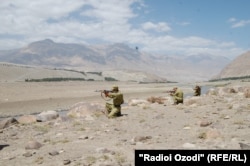 Tajik border troops train along the Afghan border.