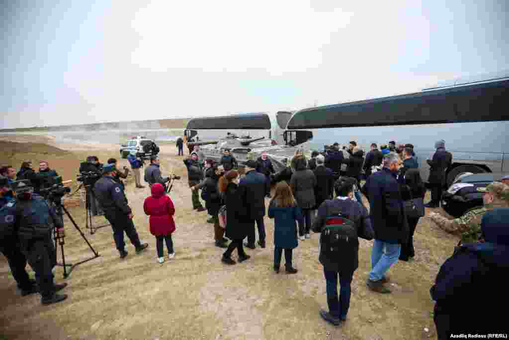 Journalists are shown an abandoned Armenian tank.