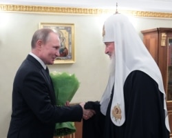 Президент России Владимир Путин и Московский партиарх Кирилл