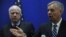 U.S. Senator Lindsey Graham (right) and Senator John McCain (left) both stopped short of calling for air strikes.