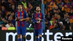 Barcelona's Luis Suarez and Lionel Messi look dejected after the match - 19.04.2017