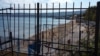 Забор на феодосийском пляже