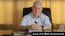 Captură video din adresarea președintelui PCRM, Vladimir Voronin, cu referire la referendumul constituțional privind aderarea la UE, inclusă în spotul publicitar refuzat spre difuzare de Teleradio-Moldova.