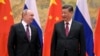 Орусиянын президенти Владимир Путин жана Кытайдын лидери Си Цзинпин. 