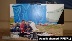 A photo displayed at an exhibition organized on World Refugee Day and dedicated to the plight of Syrian refugees, Sulaymaniya, iraq 19Jun2013