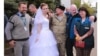 OSCE Expresses 'Regret' After Staff Shown At Separatist Wedding In Ukraine