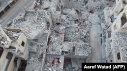 Вид с воздуха – разрушенные здания в городе Ариха в сирийской провинции Идлиб.