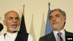 Presidential Candidates Ashraf Ghani (L) and Abdullah Abdullah. 