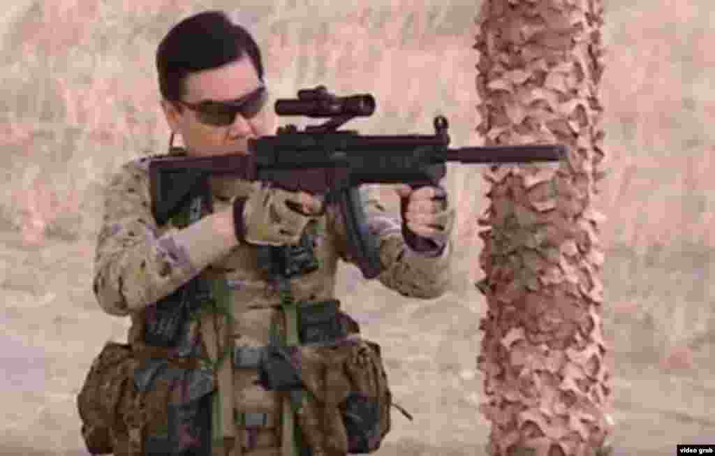 Turkmen President Gurbanguly Berdymukhammedov aims an assault rifle while filming a bizarre propaganda video released in 2017.