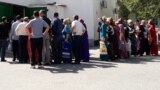 People line up to buy food at a state shop in Ashgabat. Turkmenistan, where people's lives continue to be badly affected by decades of corruption and misrule. (file photo)