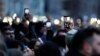 Supporters of Aleksei Navalny hold up cell phones during a rally in Moscow on April 21.