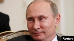 Orsýetiň prezidenti Wladimir Putin, 2013-nji ýylyň 12-nji sentýabry.