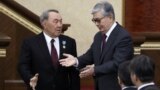 Acting President of Kazakhstan Kassym-Jomart Tokayev (R) and his predecessor Nursultan Nazarbayev attend a joint session of the houses of parliament in Astana, Kazakhstan March 20, 2019. REUTERS/Mukhtar Kholdorbekov
