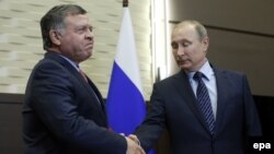 Jordanian King Abdullah II (left) and Russian President Vladimir Putin in 2015 (file photo)