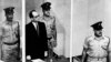 The 1961 file photo shows Adolf Eichmann standing in his glass cage, flanked by guards, in the Jerusalem courtroom during his trial in 1961 for war crimes committed during World War II.