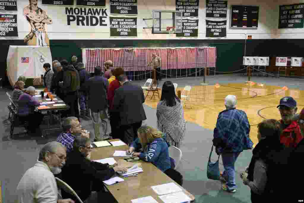Voters wait in line at a polling location in Colebrook, New Hampshire.