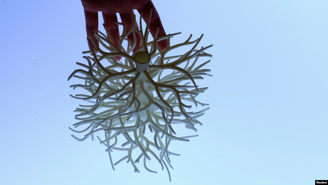 A 3D vase called "The Hidden" made by the biggest 3D printer in Europe in Leuven, Belgium. According to specialists, 3D printing removes the limitations of the manufacturing process from the equation, which means anything that can be designed on a computer can be turned into a physical object.