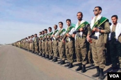 The Iranian hard-line Basij militia's activities include organizing public religious ceremonies, policing Islamic morals, and cracking down on dissident gatherings. (file photo)