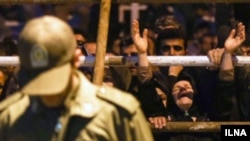 An Iranian woman crying at a public execution in Iran in 2018. 