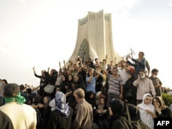 Supporters of presidential candidate Mir Hossein Musavi gather at Azadi Square during a rally in Tehran in June 2009.