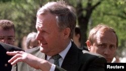 Anatoly Sobchak (left) was a mentor to Russian President Vladimir Putin (right), pictured here in May, 1994.