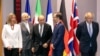 From left, European Union foreign policy chief Federica Mogherini, Iranian Foreign Minister Javad Zarif, French Foreign Minister Jean-Yves Le Drian, German Foreign Minister Heiko Maas and British Foreign Secretary Boris Johnson pose for a photo in Brussels on May 5, 2018. 