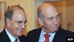 Israeli Prime Minister Ehud Olmert (right) meets with U.S. peace envoy George Mitchell in Jerusalem.