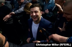 Zelenskiy tells reporters he voted "for Ukraine" after casting his ballot.