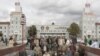 Belarus -- People walk home from their shift at a tractor plant in Minsk, 15Sep2011