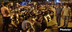 Protesters spend a third night on a blocked section of Baghramian Avenue in Yerevan on June 25.