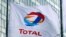 FRANCE -- FILE PHOTO: The logo of French oil giant Total on a flag at La Defense business and financial district in Courbevoie near Paris, France. May 16, 2018.